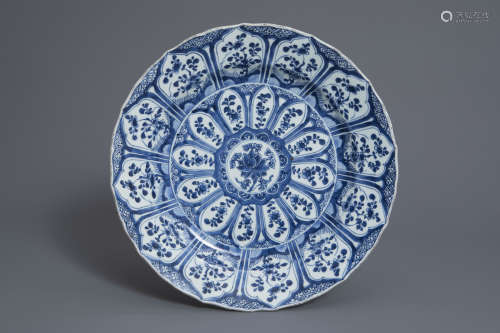 A lobed Chinese blue and white charger with floral design, Kangxi