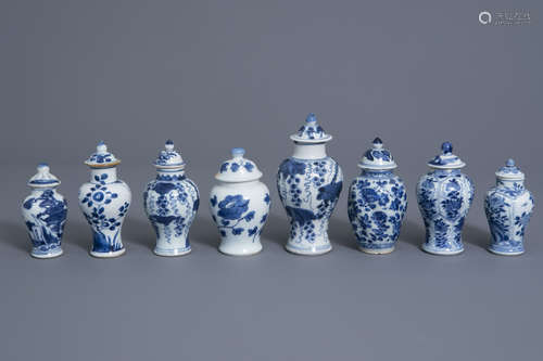 Eight small Chinese blue and white vases and covers, Kangxi