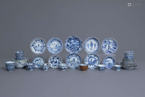 A collection of 26 Chinese blue and white saucers and 18 cups, Kangxi and later