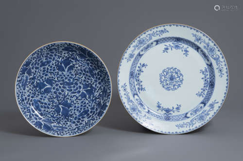 Two large Chinese blue and white chargers with floral design, Kangxi and Qianlong