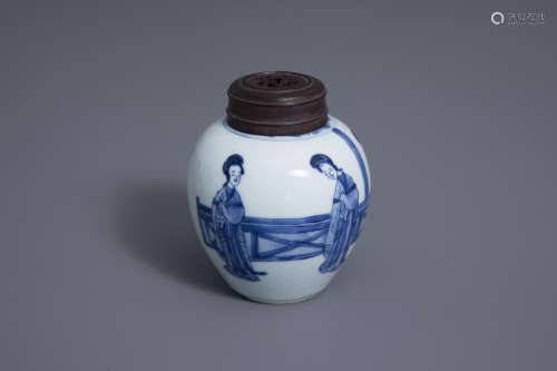 A Chinese blue and white vase with wooden cover, Kangxi