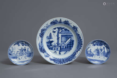 A Chinese blue and white plate and a pair of fine saucers, Kangxi