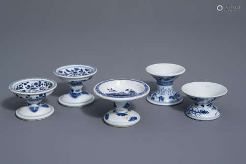 Five Chinese blue and white stemmed footed salts with floral design, Kangxi
