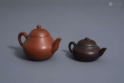 Two Chinese Yixing stoneware teapots and covers, 19th C.