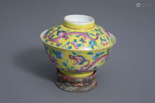 A Chinese famille rose yellow ground covered bowl on embroidered stand, 19th C.