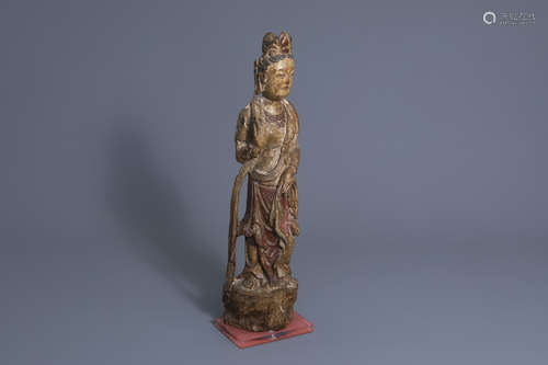 A Chinese lacquered and painted wood figure of Guanyin, 18th/19th C.