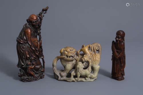 Three Chinese carved wood and soapstone sculptures, 19th/20th C.