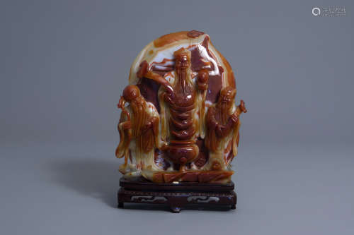 A large Chinese carved agate 'Three immortals' group, 20th C.
