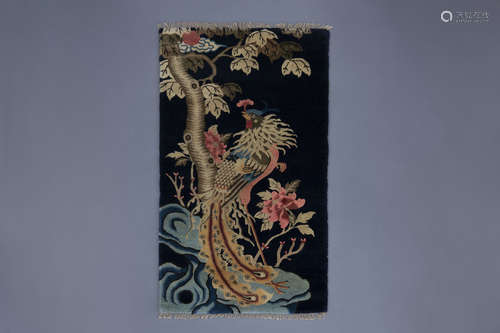 A Chinese 'phoenix among blossoming branches' carpet, Republic, 1st half 20th C.