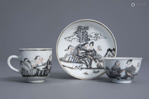 Two Chinese grisaille 'Seducing musician with Amor' cups and a saucer, Qianlong