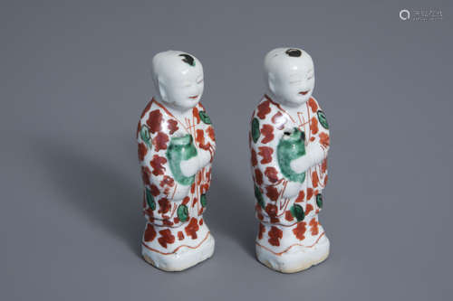 A pair of Chinese famille verte Hoho boys joss stick holders, Kangxi