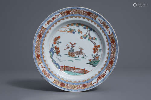 A Chinese famille verte Imari style plate with a deer harnessed to a floral carriage, Kangxi/Yongzheng