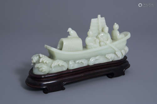 A large Chinese carved celadon jade model of a boat, 19th C.