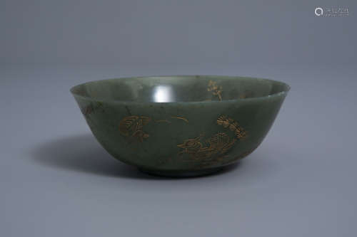 A Chinese spinach green jade engraved and gilt bowl, 19th/20th C.