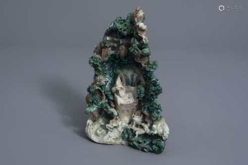 A Chinese carved spinach jade 'Buddha' group, 20th C.