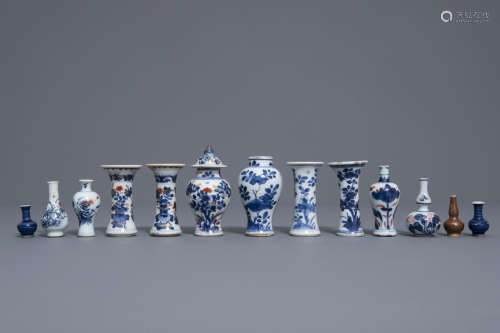 Thirteen Chinese blue, white, iron red and monochrome doll's house miniature vases, Kangxi/Qianlong