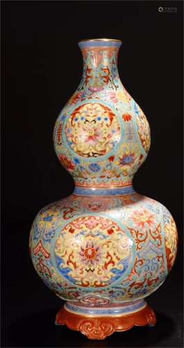 A Chinese Turquoise-Green Ground Famille-Rose Porcelain Double Gourd Vase