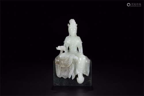 A Chinese Carved Jade Figure of Seated Buddha