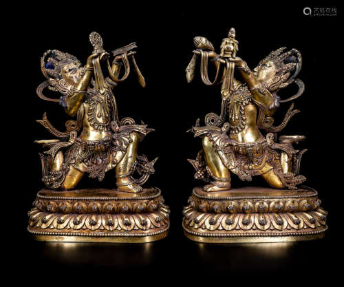 A Pair of Chinese Gilt Bronze Figures of Buddha