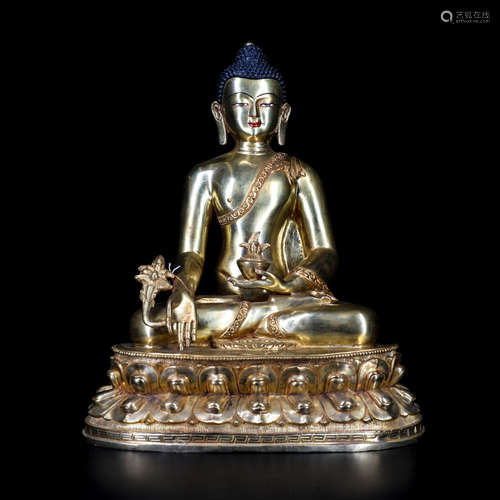 A Chinese Gilt Bronze Figure of Buddha