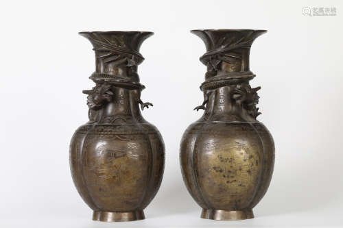 A pair of Panlong copper bottles