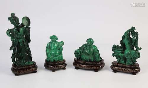 CHINE, XXème siècle. \nQuatre statuettes en malachi…