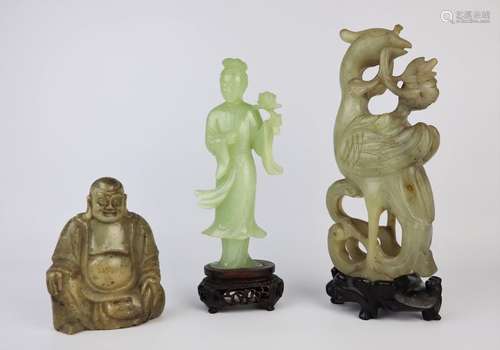 CHINE, XXème siècle. \nTrois statuettes en pierre d…