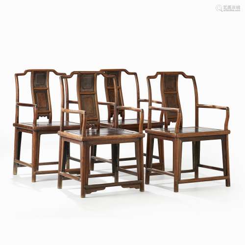 A Set of Four Armchairs