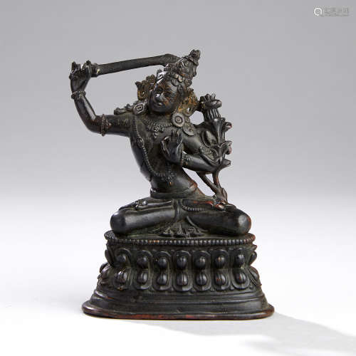 A Tibetan Bronze Figure of Manjushri