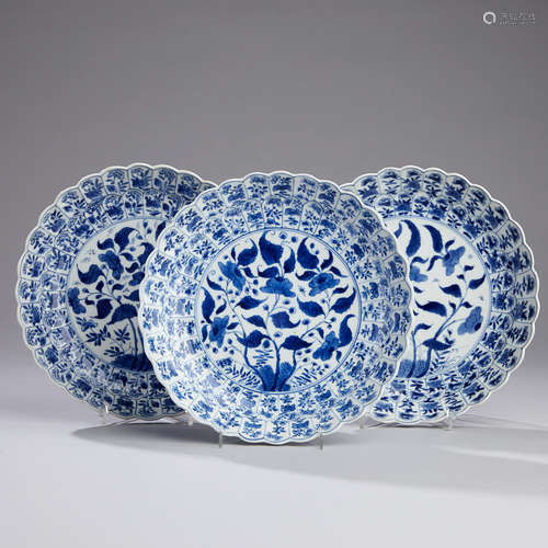 A Set of Three Blue and White Moulded Dishes