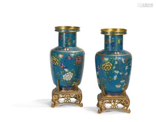 Pair of cylindrical vases in bronze and enamelled …