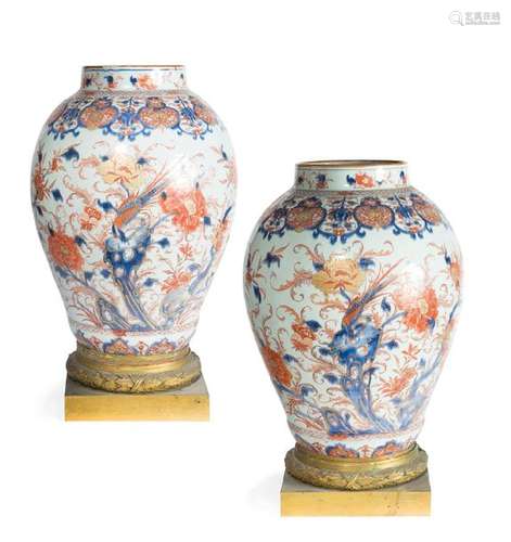 Pair of polychrome porcelain pots with \