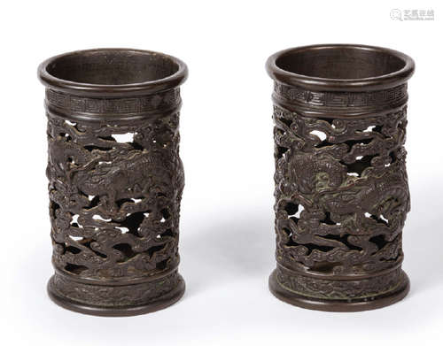 Pair of bronze brush holders with openwork decorat…