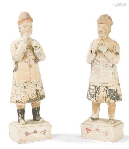 Pair of enamelled terracotta sculptures representi…