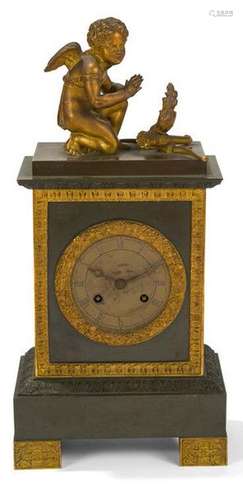 Patinated and gilded bronze clock surmounted by a …