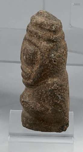 Anthropomorphic idol carved with a face with overs…