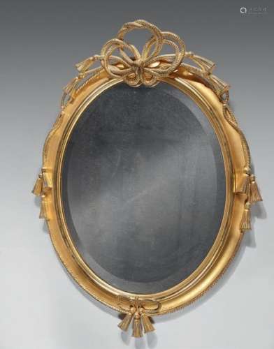 Mirror with oval frame in gilded wood, decorated w…