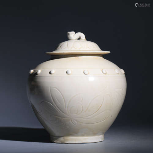 A DING YAO WHITE GLAZE CARVED JAR