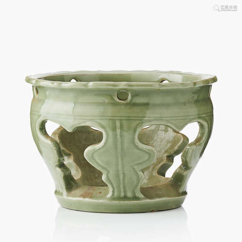 4. A Longquan celadon reticulated brazier stand