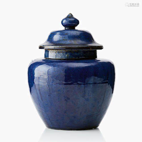 109. A Blue Glazed Vase and Cover