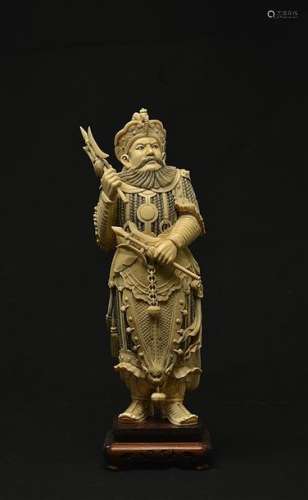 X] IVORY SCULPTURE WITH THE EFFIGY OF A TAOIST GOD…
