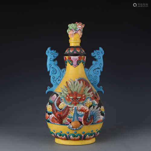 A Qianlong yellow green and purple three colored Dragon Statue