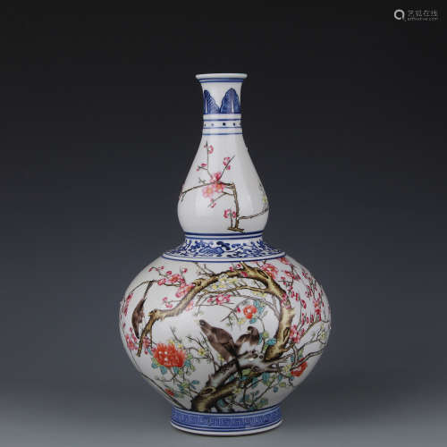 A Vase in the shape of a gourd with pink 'flower and bird' pattern in
Yongzheng period