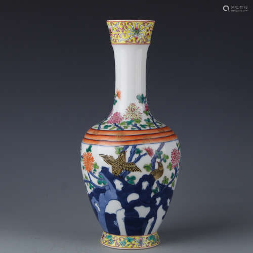 A Qianlong blue and white flower and bird rattle statue