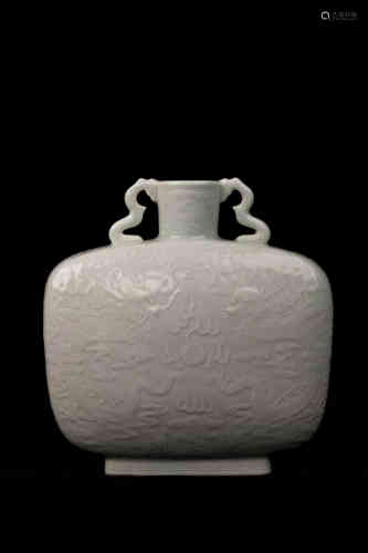 An Incised White Glazed Dragon Vase