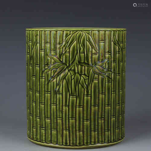 A Green glazed brush pot with bamboo patterns in Qianlong period
