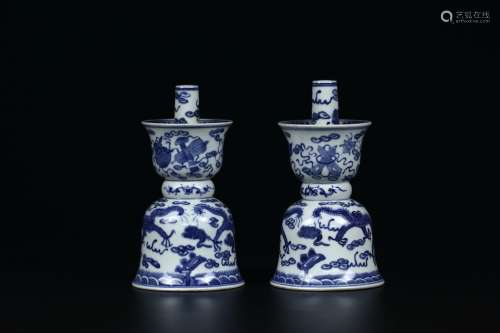 A Pair of Blue and White Porcelain Dragon Candle Sticks