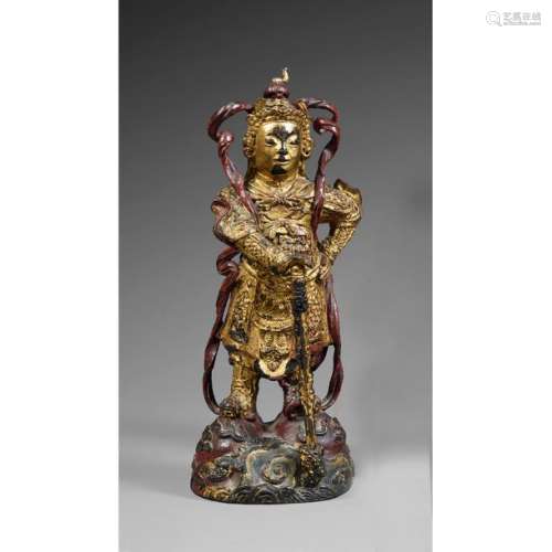 STATUETTE OF TIAN WANG in lacquered and gilded bro…