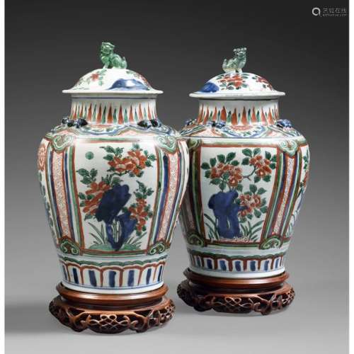 PAY OF COVERED BALUSTRY JARS in porcelain and poly…