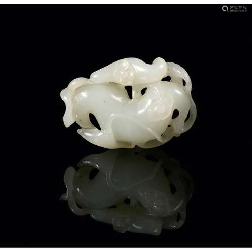 PENDANT made of white nephrite jade, with carved a…